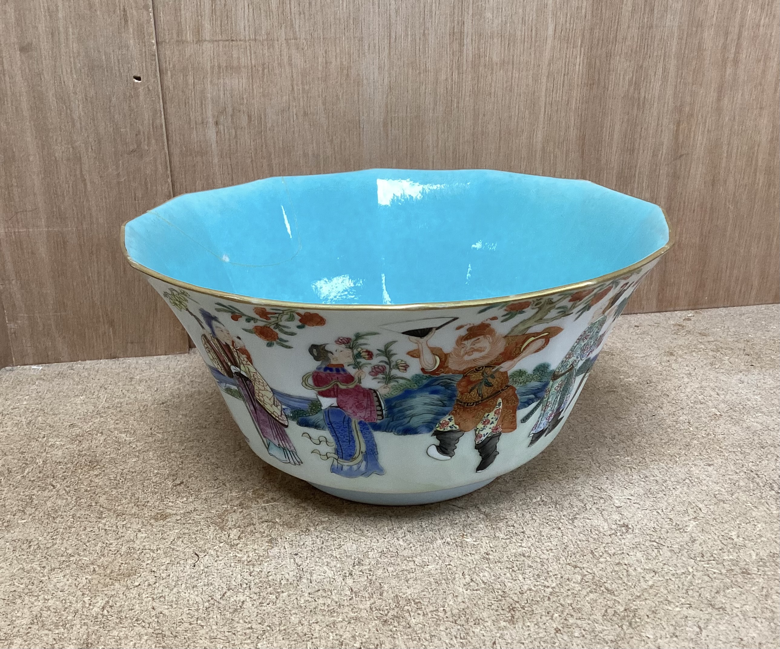 A Chinese famille rose bowl, Daoguang seal mark and of the period (1821-50), painted with famous historical and mythical figures, 18cm diameter (a.f.)